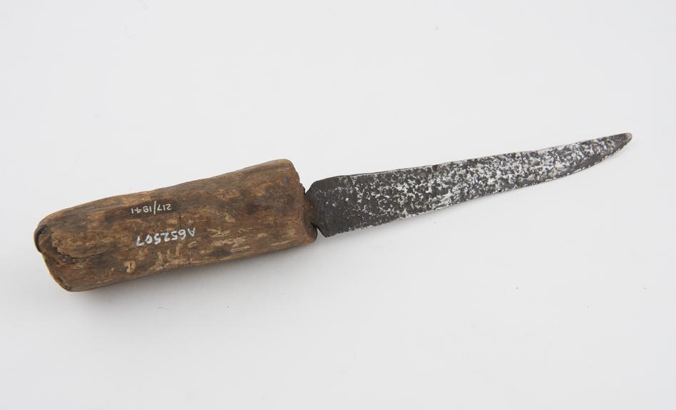 Knife with rough wooden handle