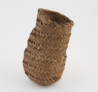 Basket, plaited grasses, contains surgical instruments, Algerian