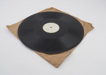 Record marked 'J' on one side and 'G' on other