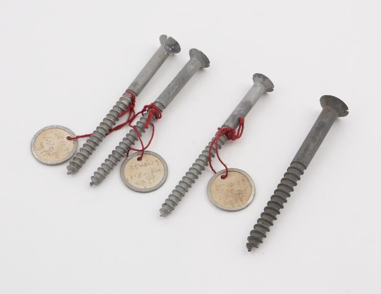 Four screws, 88mm long, sherardized by Cowper Coles, c1929.