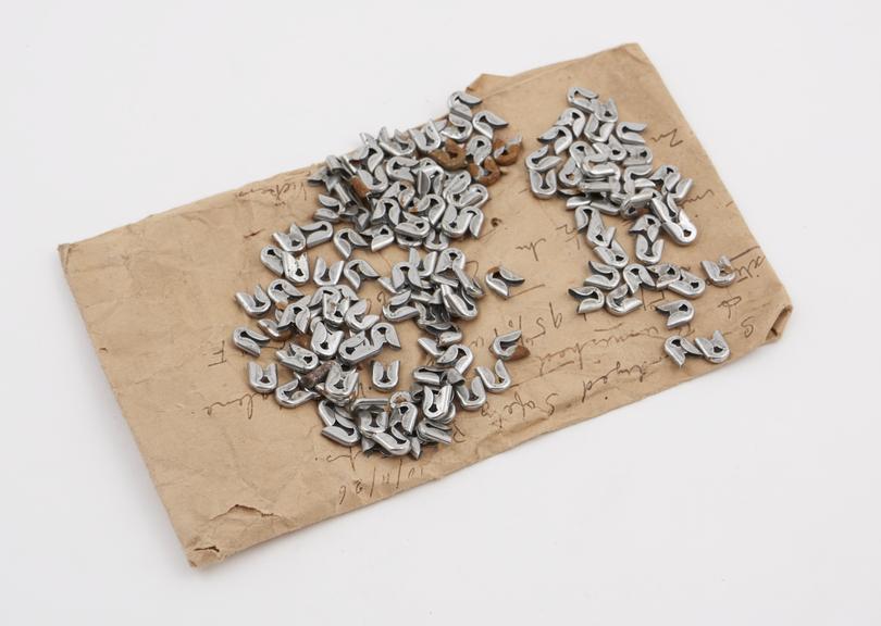 Safety pin caps, sherardized  by Cowper Coles