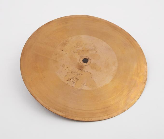 Flat copper disc used for voice recording known as Minivoice'