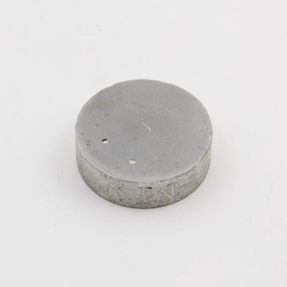 Zinc disc, 35mm diameter and 10mm thick.