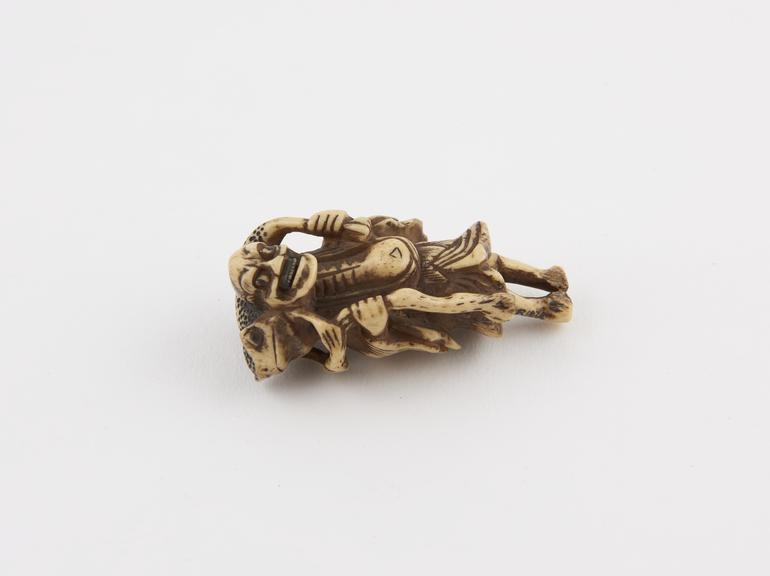 Bone or ivory netsuke, in the form of a Gama Sennin with toad