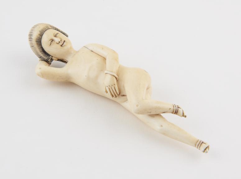 Ivory diagnostic figure, in the form of a recumbent female