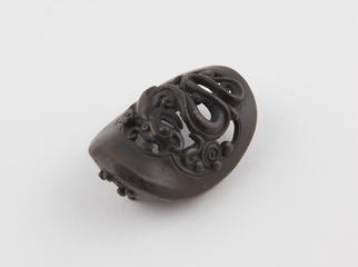 Part of Chinese shrine showing undulating dragon