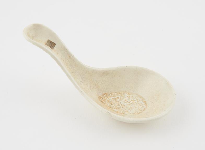 Earthenware spoon with dragon design on bowl, Chinese, 1400-1850