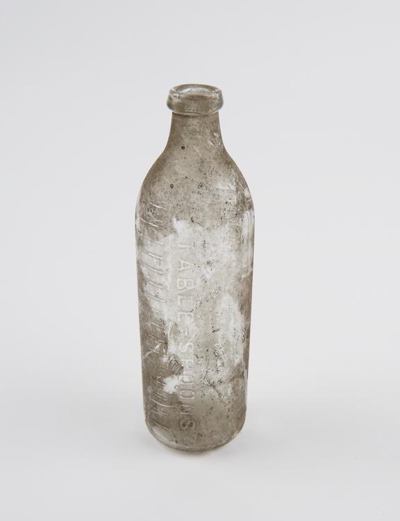 Glass infant's feeding bottle, English, 1920-1960