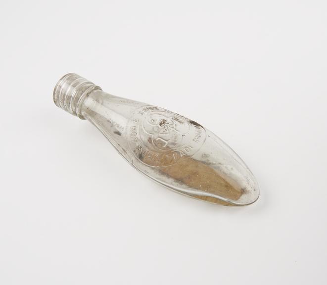 Glass infant's feeding bottle, made by S