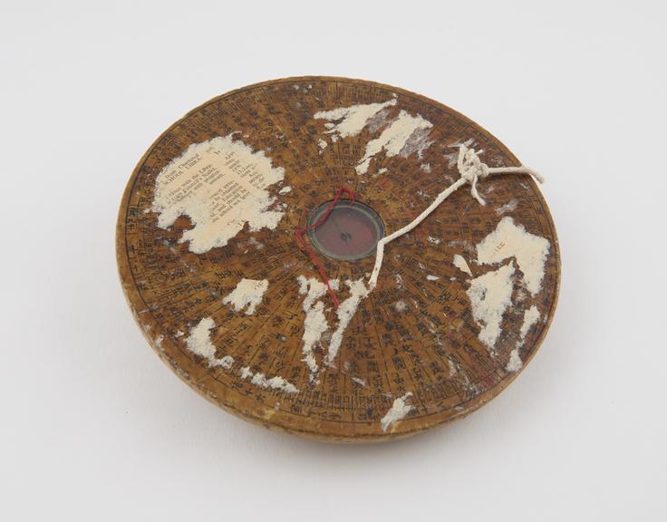 Circular wooden geomantic compass, called a Co-pan'