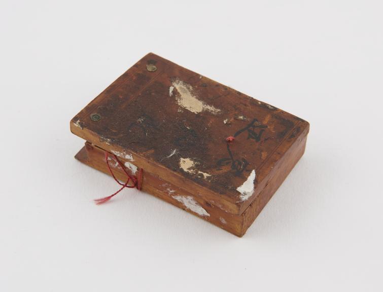 Compass and sundial, two hinged wooden blocks