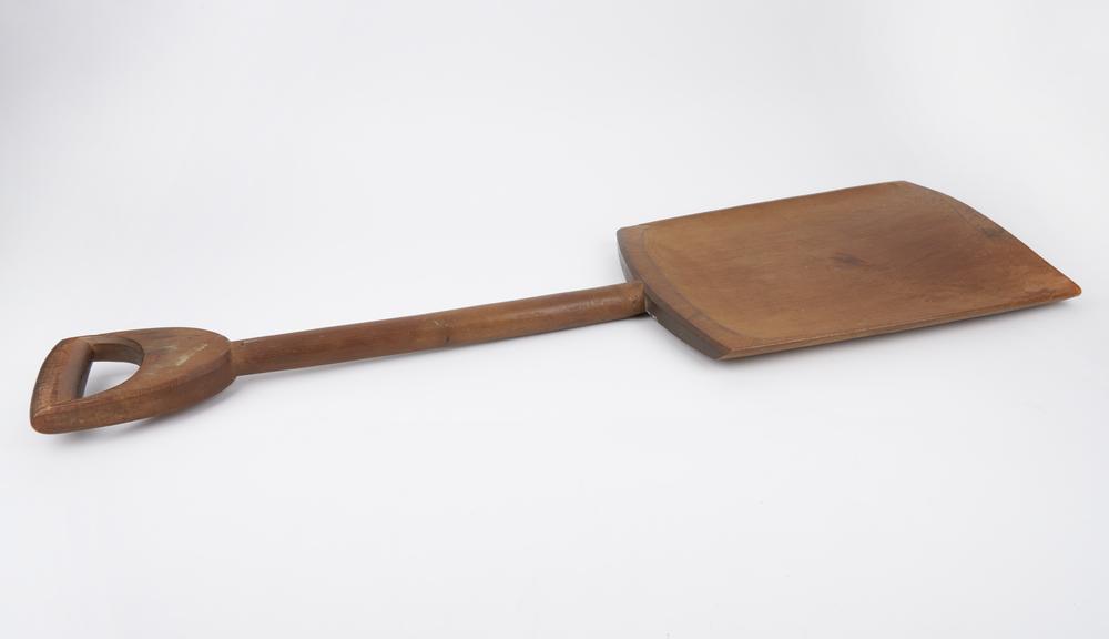 Wooden corn shovel