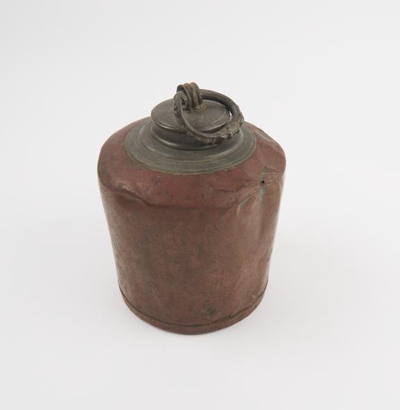 Cylindrical hot water bottle of copper with pewter neck and