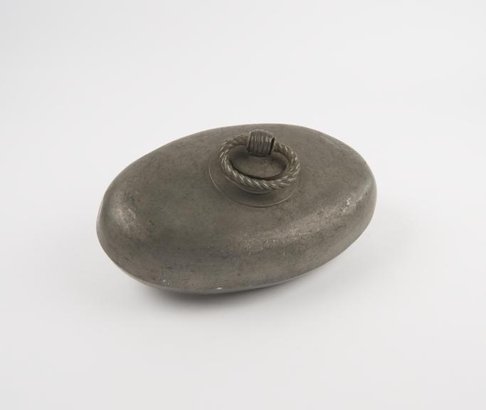 Oval pewter hot water bottle