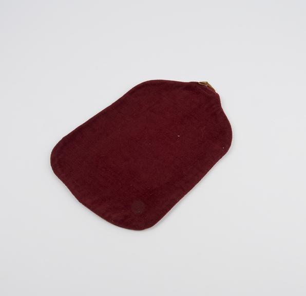 Hot water bottle cover, maroon velvet, English, 1920-1950