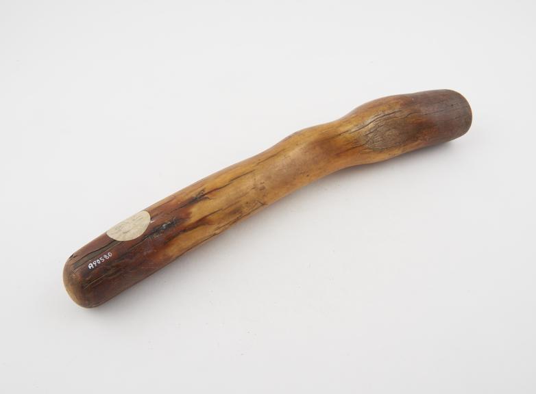 Solid ivory pestle, shaped like a club waisted hand-grip