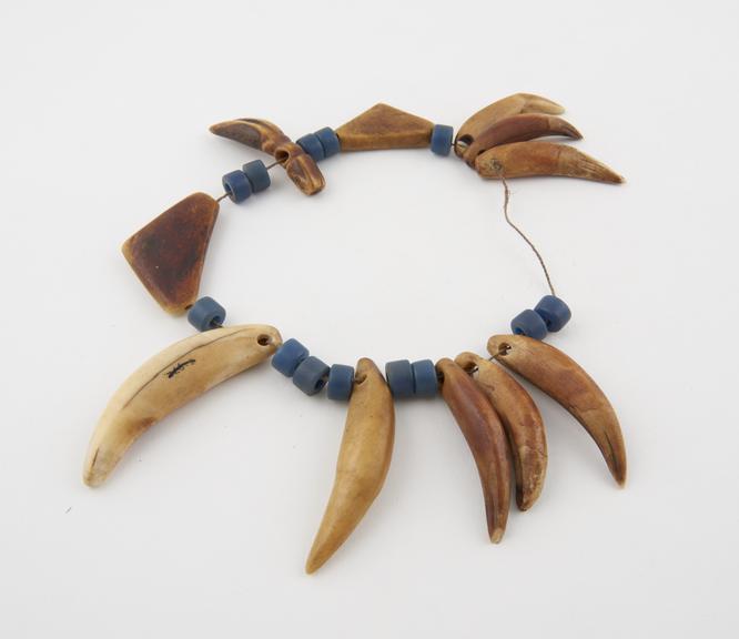 Amuletic necklace of teeth, horn and beads, Africa, 1880-1920