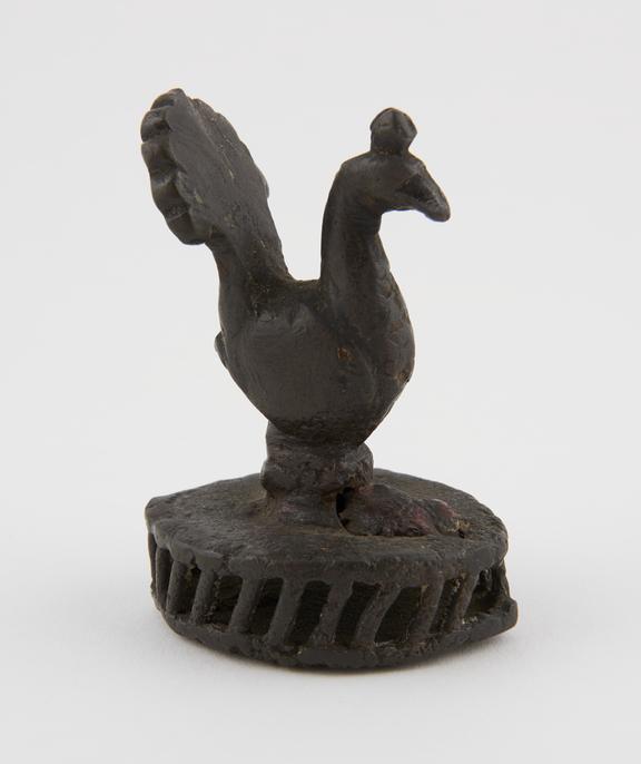 Bronze foot scraper, with peacock handle, Indian, 1801-1900
