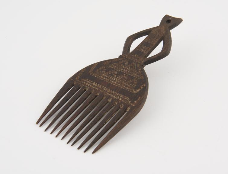 Carved wooden comb