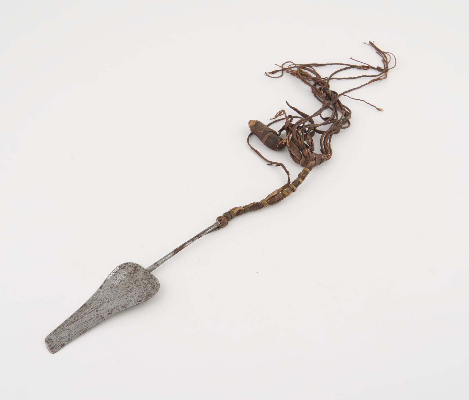Strigil, steel, with copper-decorated leather tarsel | Science Museum ...