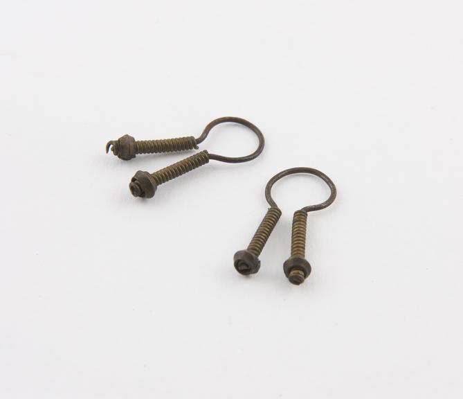 Pair of earrings, of looped brass wire, Kikuyu tribe, Kenya