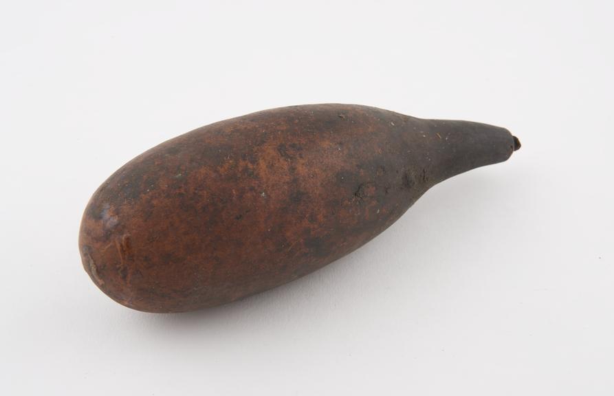 Gourd container full of black powder, drop-shaped