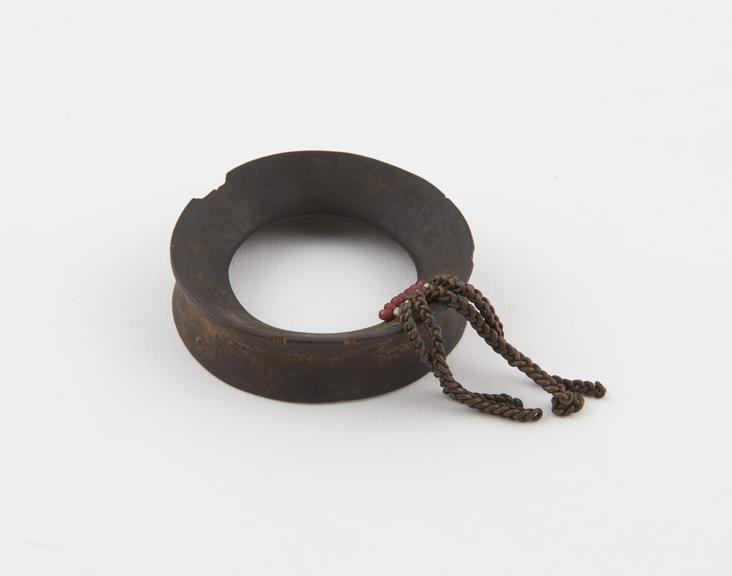 Circular wooden ring, with indented outside edge