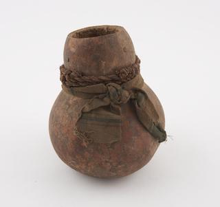 Container, gourd, sealed with string and cloth