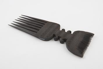 Black wooden comb with two rows teeth