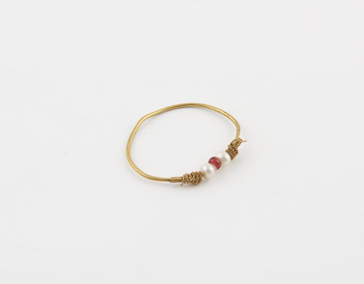 Brass nose ring with decorative beads, Zanzibar, Africa