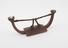 Wooden bentwood' headrest fitted with leather thong and