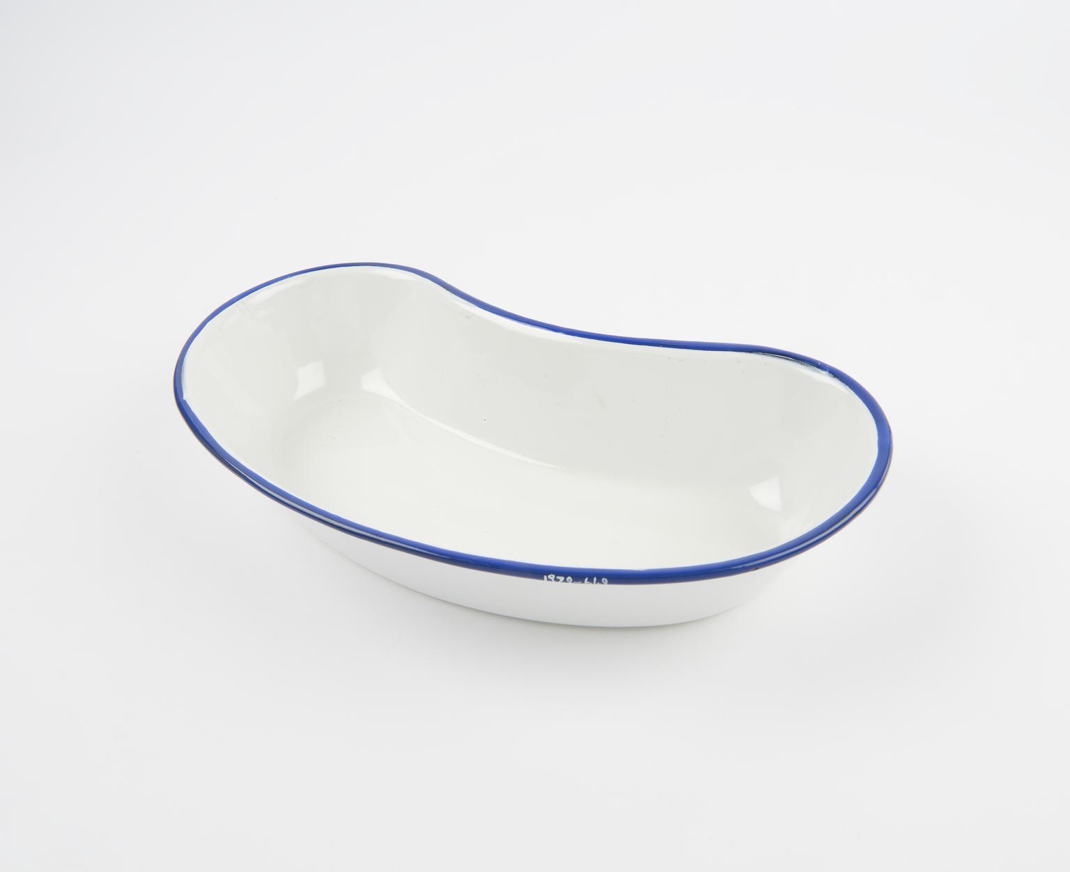 White kidney dish with a blue rim