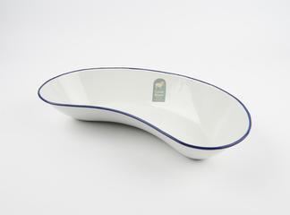 White kidney dish with a blue rim