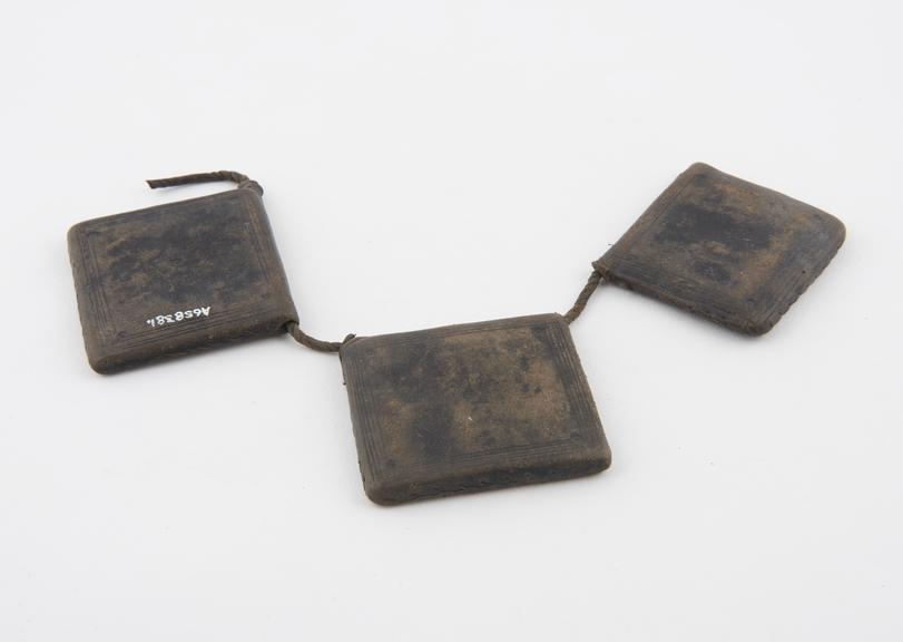 3 brown leather amulet cases