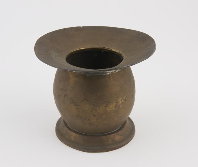 Circular, brass spittoon, nickel plated, with broad flared rim