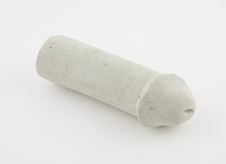 Stone penis, votive offering