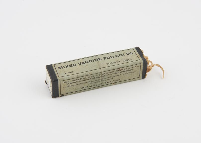 Ampoule of cold vaccine with instructions in original carton