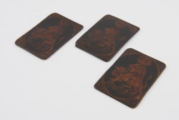 Playing cards showing lions copulating