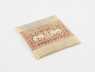 Decorated Buddhist double-sided comb