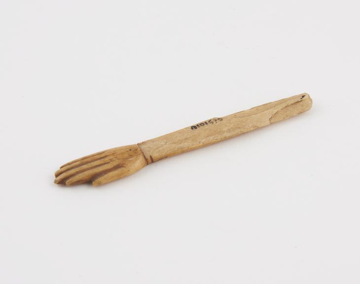 Bone hand and forearm, chipped, Europe, back scratcher