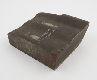 One portion of a worn Crusher Jaw