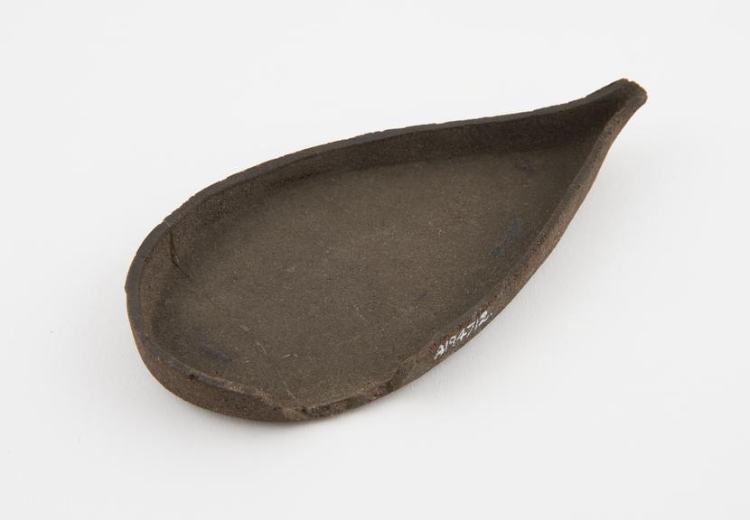 Shallow, drop-shaped dish