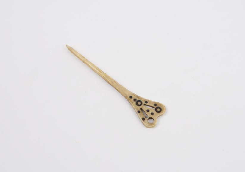 Hair or nose pin, of carved bone, key shaped