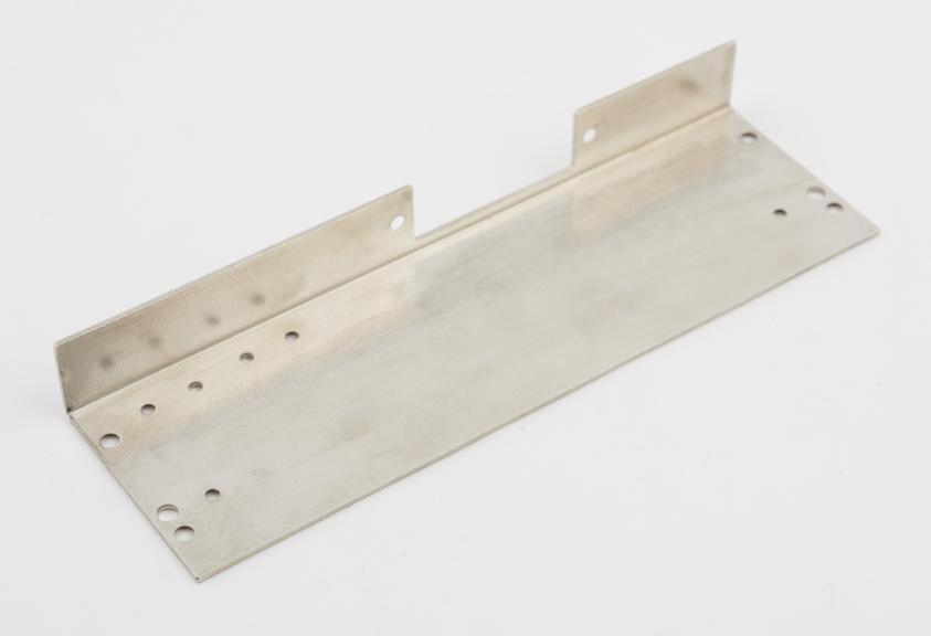 Mild steel pressing for electronics panel with bright nickel