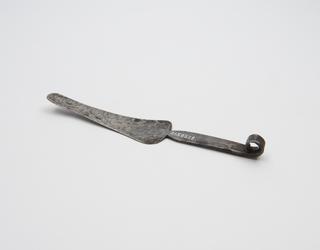 Steel strigil