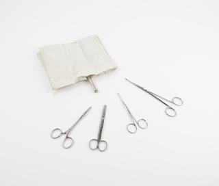Stainless steel forceps and scissors in canvas case