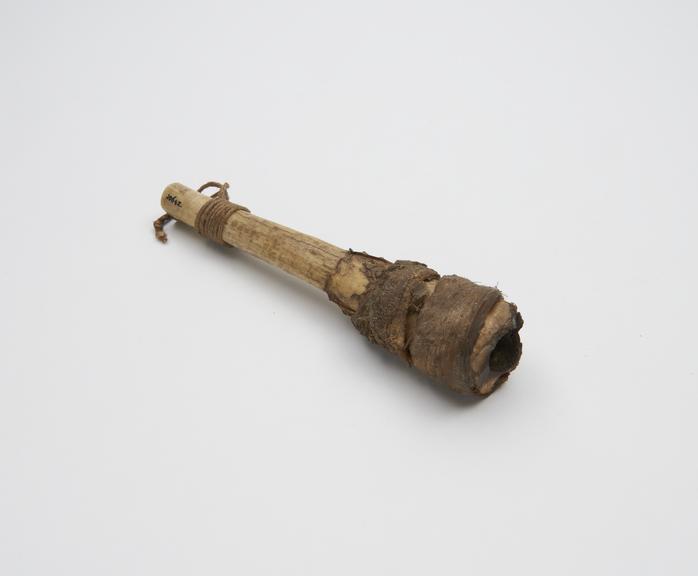 Smoking tube made from the shin bone of an animal