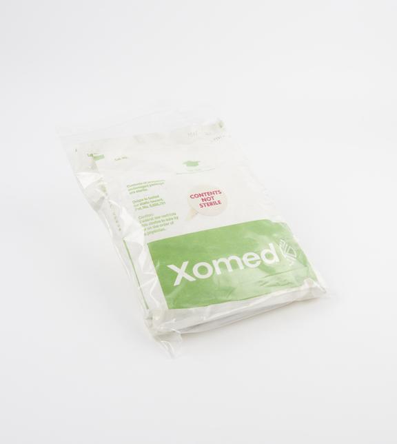 Two transparent plastic drapes, for surgical use, by Xomed Inc