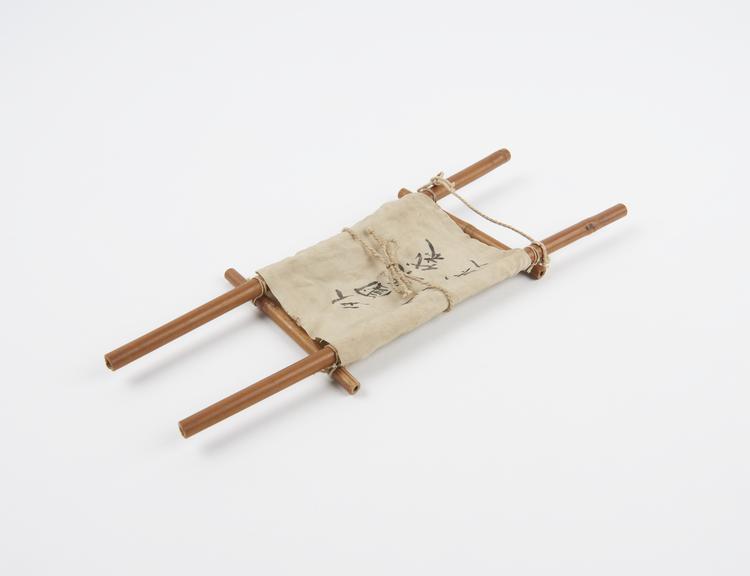 Model stretcher, cane, canvas and string, Japanese, 1900-1918