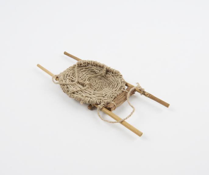 Model stretcher, cane and string, reputedly Japanese, 1900-1918